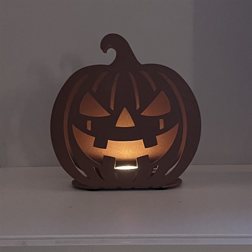 Pumpa umbra med vämeljus