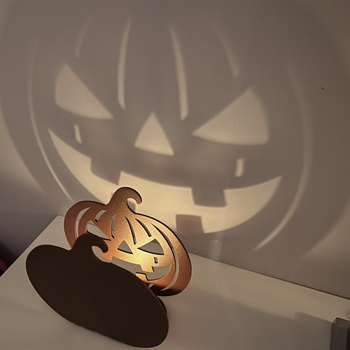 Pumpa skuggbild mot vägg